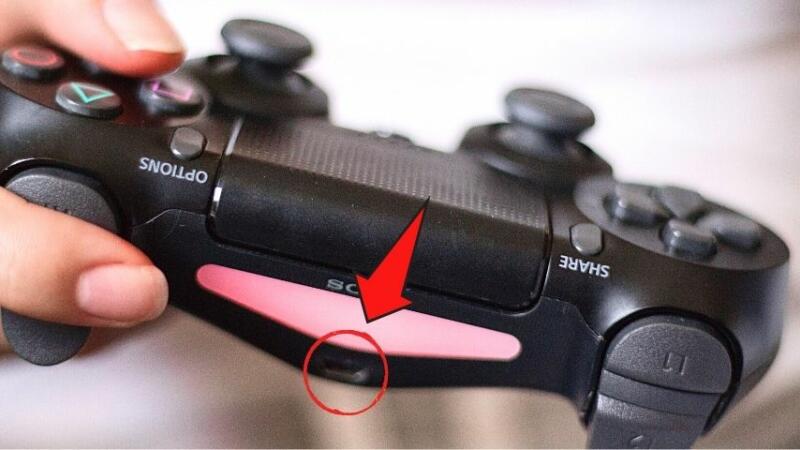 Plug the small end of the USB cable into the PS5 controller